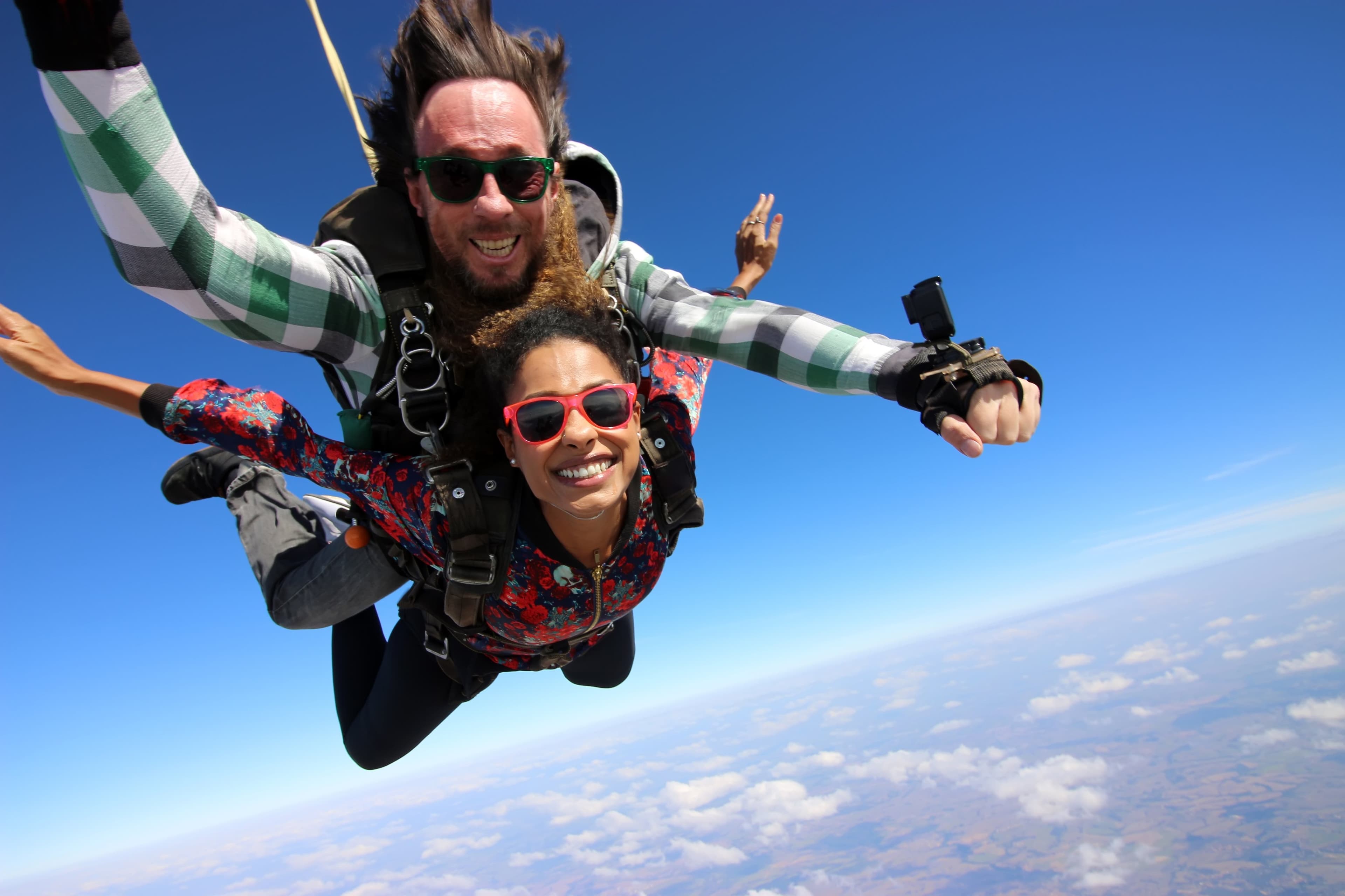 A couple sky diving